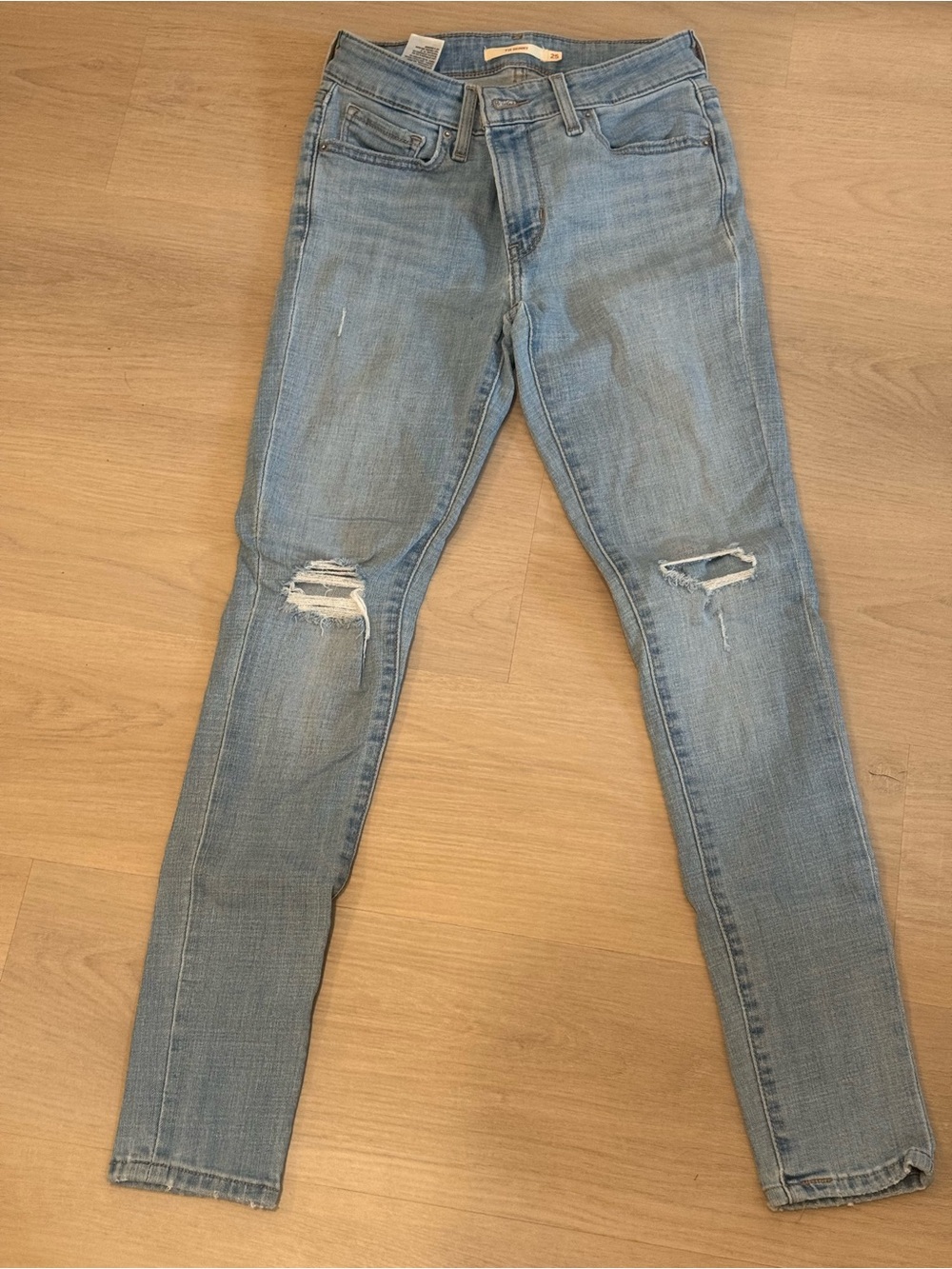Levi’s 711 Light Blue Ripped Women’s Skinny Jeans